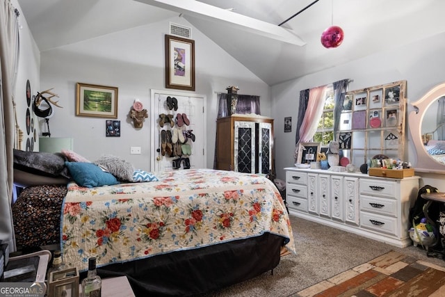 bedroom featuring light colored carpet and vaulted ceiling