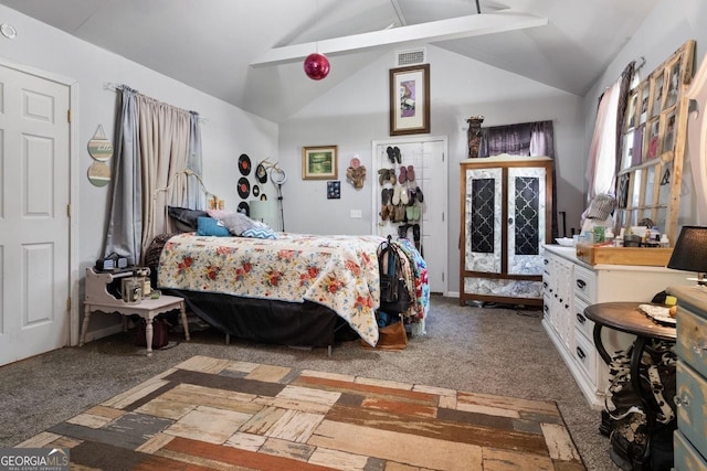 carpeted bedroom featuring lofted ceiling