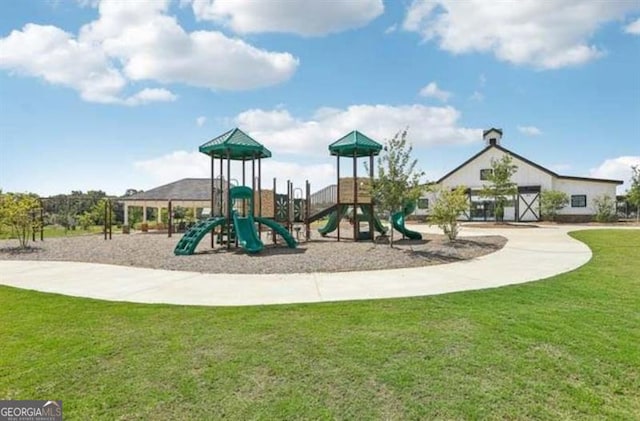 view of jungle gym with a yard