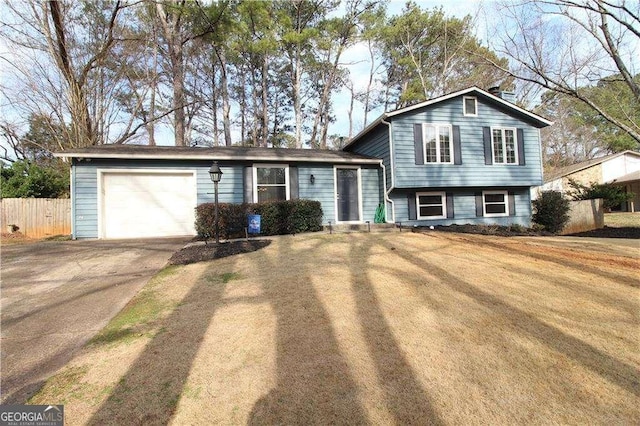 split level home featuring a garage