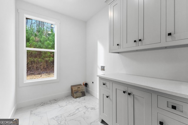 laundry room featuring cabinets and hookup for a washing machine