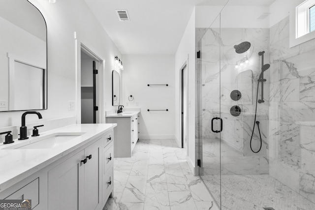 bathroom featuring vanity and an enclosed shower