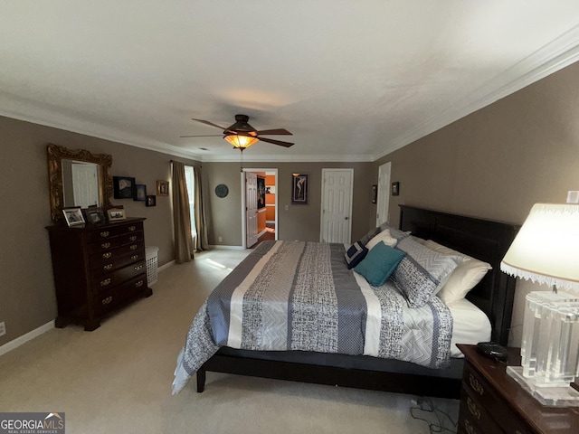 bedroom with ceiling fan, ornamental molding, light carpet, a spacious closet, and a closet