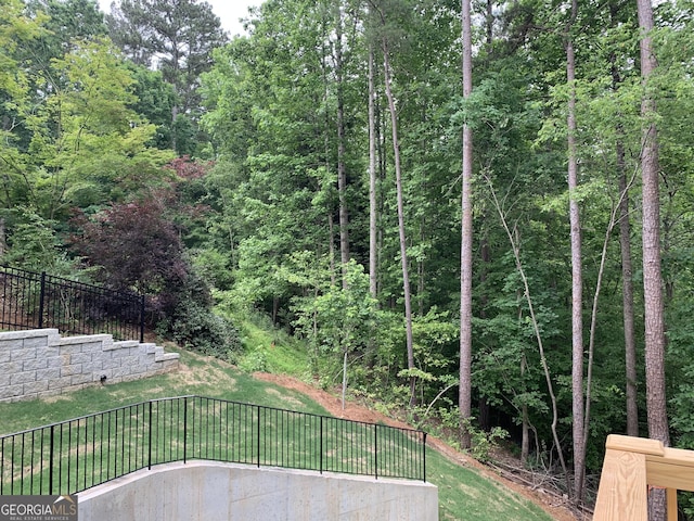 7406 Grand Reunion Dr, Hoschton, GA 30548 - view of yard with a forest view