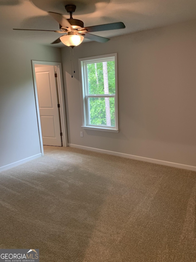 7406 Grand Reunion Dr, Hoschton, GA 30548 - unfurnished room with ceiling fan, carpet flooring, and baseboards