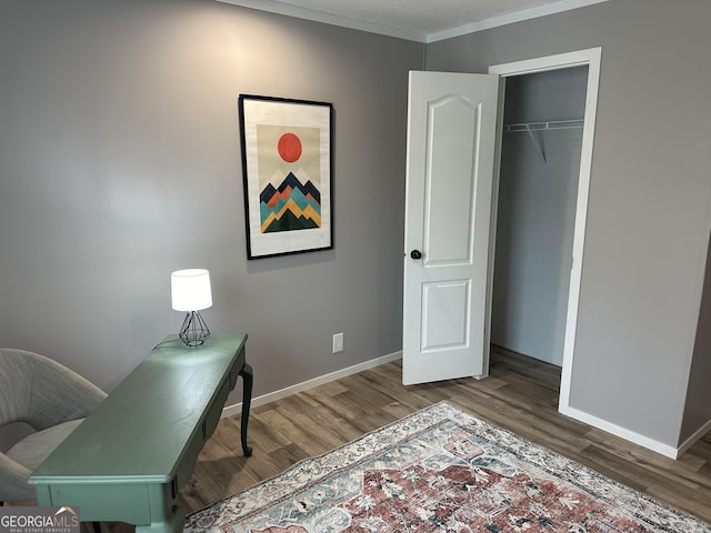 office featuring crown molding and wood-type flooring