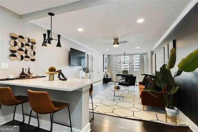 interior space with ceiling fan and light hardwood / wood-style floors