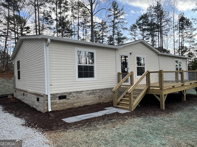 view of front of house with a deck