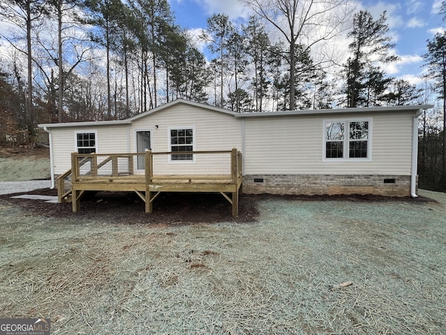 view of front of property with a deck