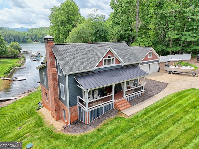 520 Long View Dr, Hiawassee, GA 30546 - view of front of home with a water view, a porch, a front yard, brick siding, and a chimney