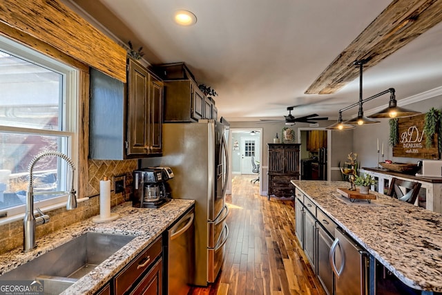 520 Long View Dr, Hiawassee, GA 30546 - kitchen with a sink, dishwasher, tasteful backsplash, dark wood-style floors, and light stone countertops