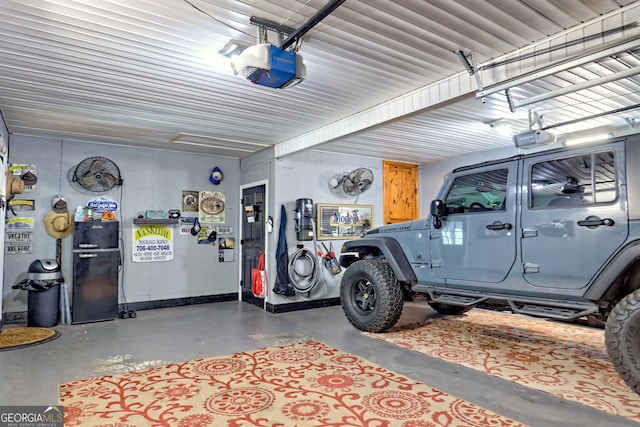 520 Long View Dr, Hiawassee, GA 30546 - garage featuring a garage door opener