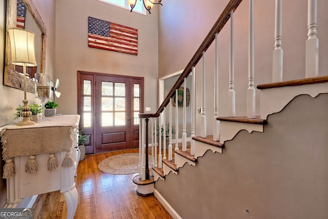 520 Long View Dr, Hiawassee, GA 30546 - foyer with a high ceiling, wood finished floors, and stairs