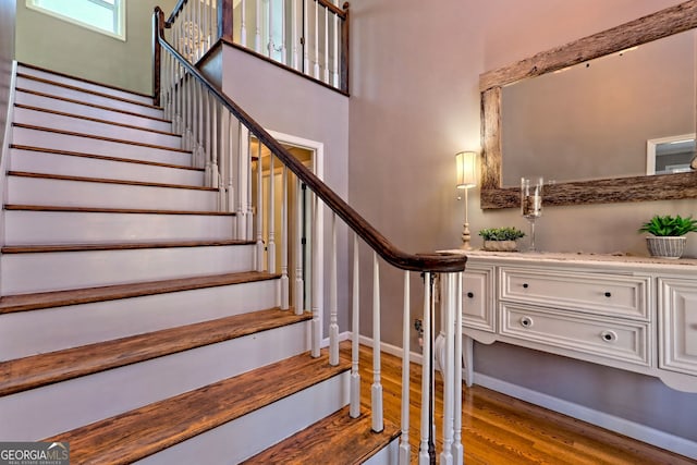 520 Long View Dr, Hiawassee, GA 30546 - staircase featuring wood finished floors and baseboards