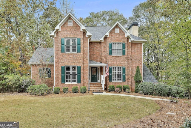 view of front of property with a front lawn