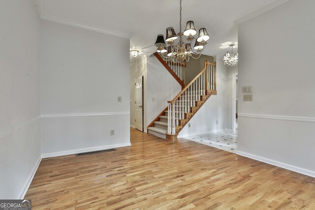 unfurnished living room featuring ornamental molding, light colored carpet, ceiling fan, and a fireplace