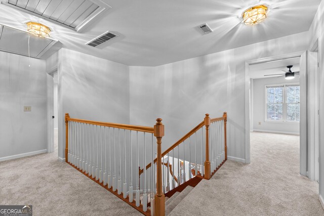 stairway with carpet floors