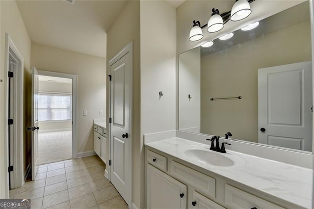 bathroom featuring vanity and tile patterned floors