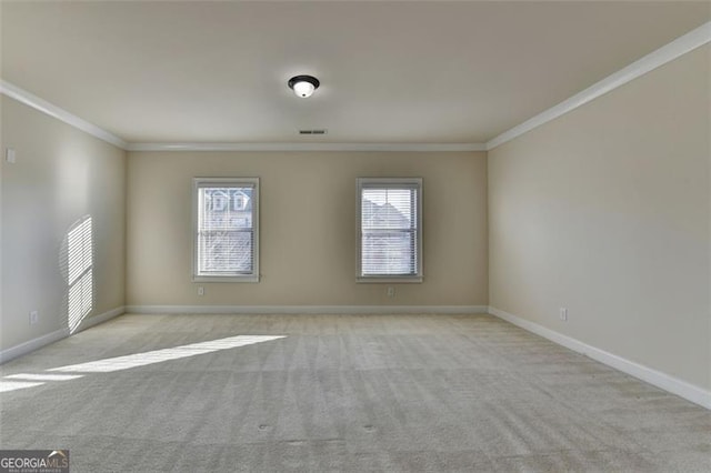 carpeted empty room with ornamental molding