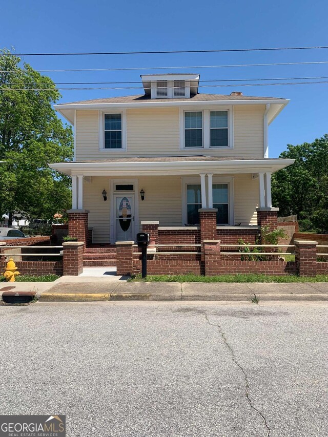 view of front of property featuring central AC