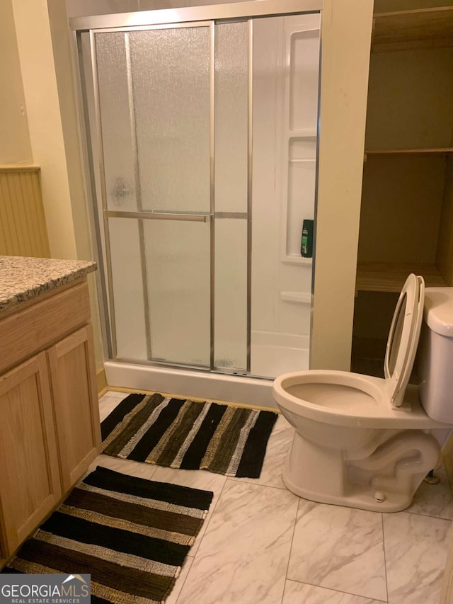 1102 Phillips St, Augusta, GA 30901 - bathroom featuring walk in shower, vanity, and toilet
