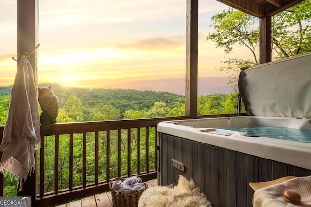 273 Deer Crest Hts, Blue Ridge, GA 30513 - deck at dusk with a hot tub