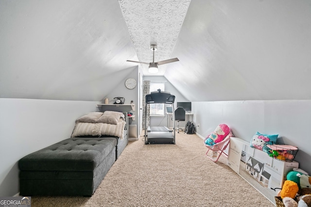 recreation room featuring lofted ceiling and carpet