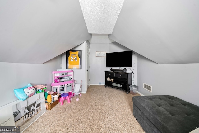 game room with lofted ceiling and carpet floors