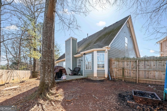 rear view of property with a patio