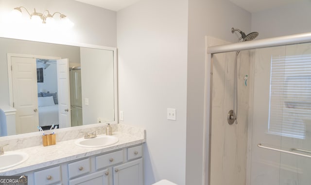 bathroom with vanity and walk in shower