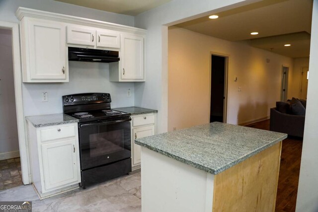 kitchen featuring white cabinetry, black range with electric stovetop, and light stone countertops