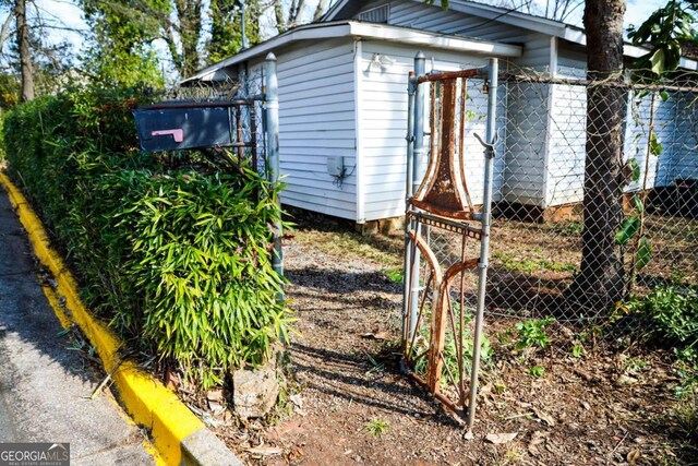 view of side of property featuring an outdoor structure