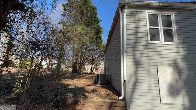 view of home's exterior with central AC