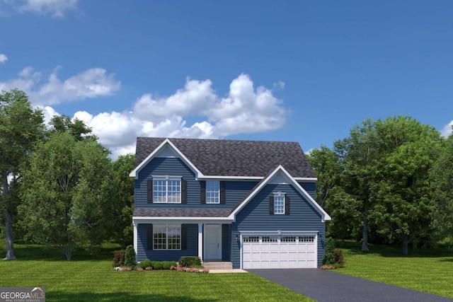 view of front of property featuring a garage and a front yard