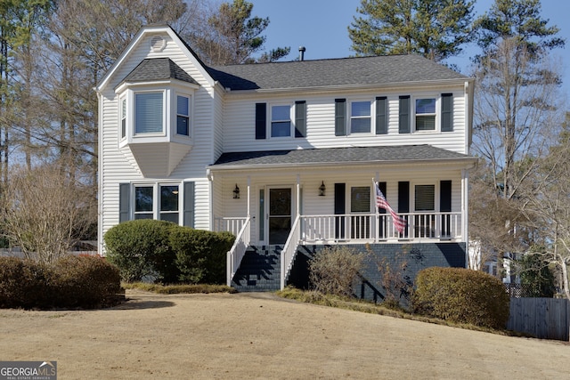 view of front property featuring a porch