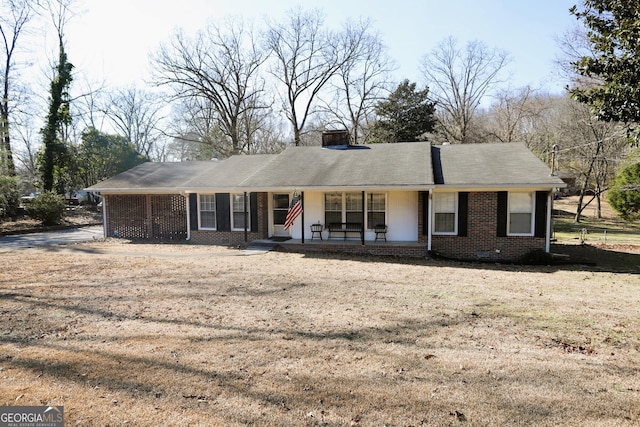 427 Oak Hill Dr, Trion, GA 30753 - single story home with brick siding, a porch, and a chimney
