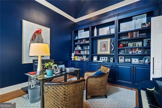 sitting room featuring hardwood / wood-style flooring and vaulted ceiling