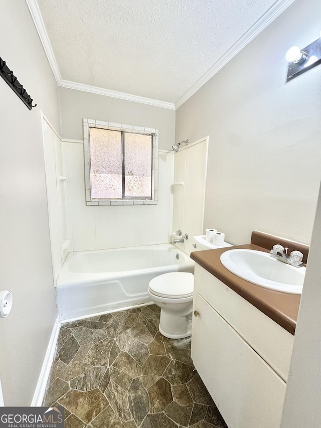 full bathroom featuring crown molding, tiled shower / bath, toilet, and a textured ceiling