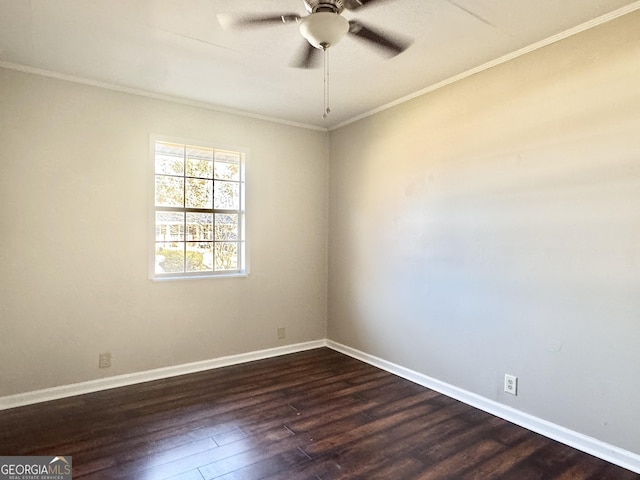 spare room with ceiling fan, ornamental molding, and dark hardwood / wood-style flooring