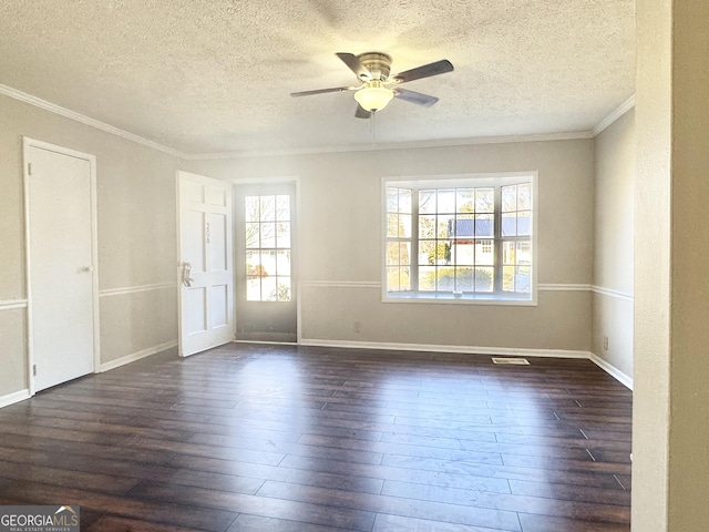 empty room featuring crown molding, ceiling fan, dark hardwood / wood-style flooring, and a textured ceiling