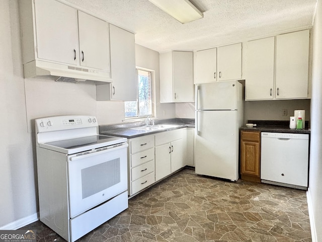 kitchen with sink, white appliances, a textured ceiling, and white cabinets