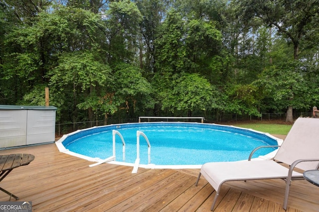 view of pool with a deck