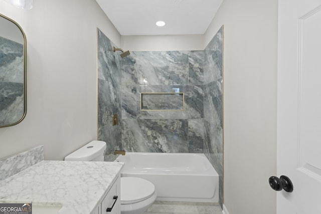 bathroom featuring vanity, toilet, and shower / bath combination