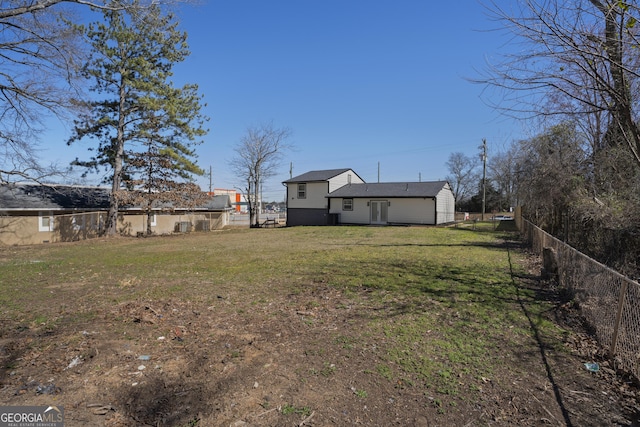 view of yard with fence