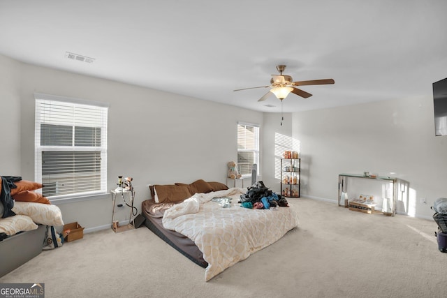 bedroom featuring carpet floors and ceiling fan