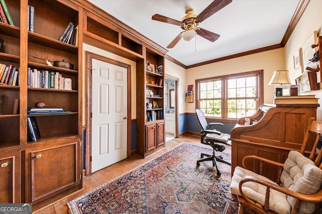 office space with ornamental molding, ceiling fan, and light hardwood / wood-style floors