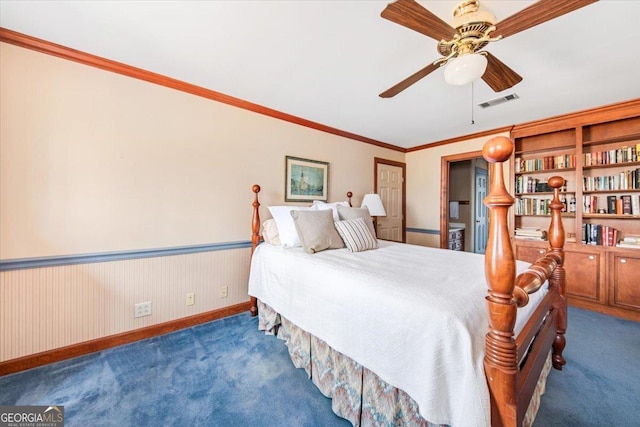 carpeted bedroom featuring crown molding