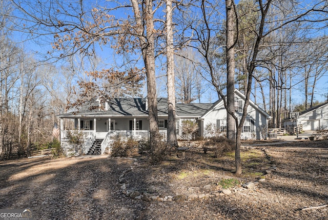 ranch-style home featuring covered porch