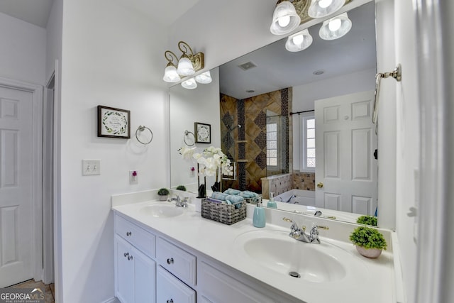 bathroom with vanity and separate shower and tub