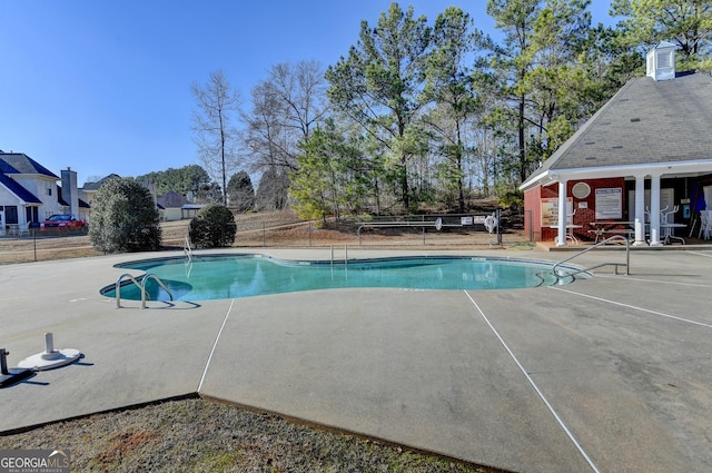 view of swimming pool featuring a patio area